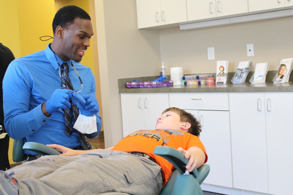 Austin Orthodontist Speaking To A Patient Austin Orthodontist Rj Orthodontics 