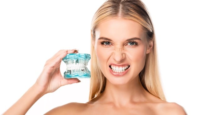 Orthodontist in Austin, TX explains braces vs Invisalign for straighter teeth